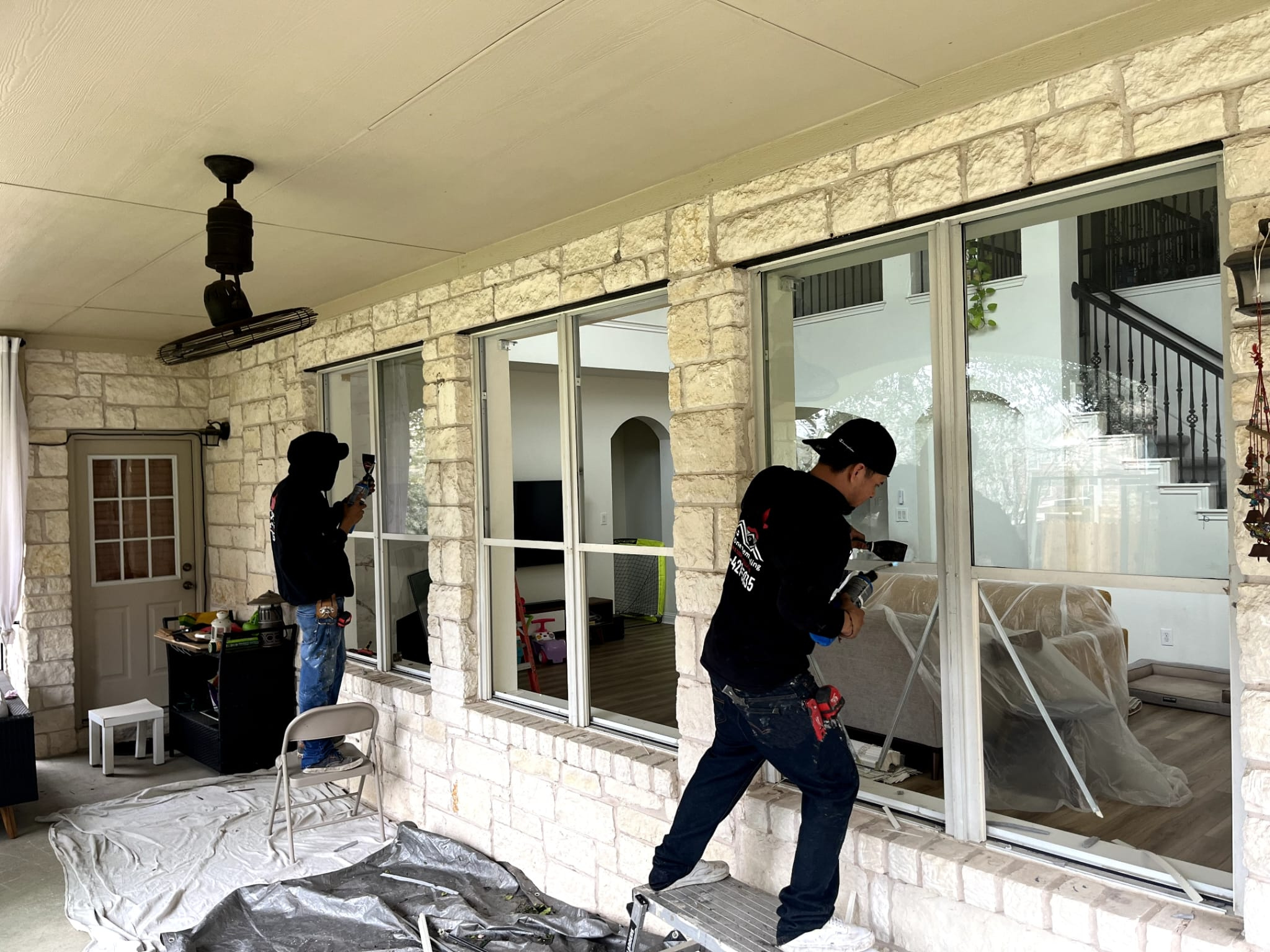Star One Remodeling crew installing windows in a Central Texas home